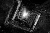 <p>This dark, decaying hallway leads to nowhere.</p>