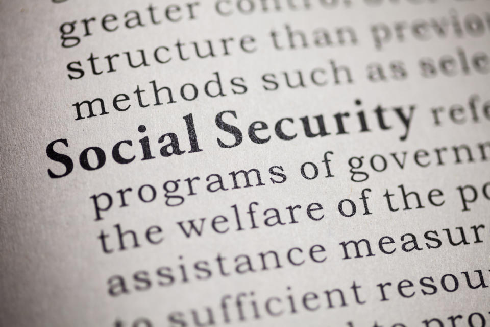 Closeup of a dictionary page, defining the words "Social Security"