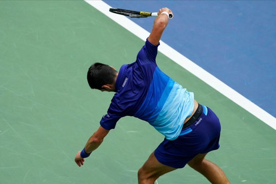 Novak Djokovic smashes his racket early in the second set (Seth Wenig/AP) (AP)