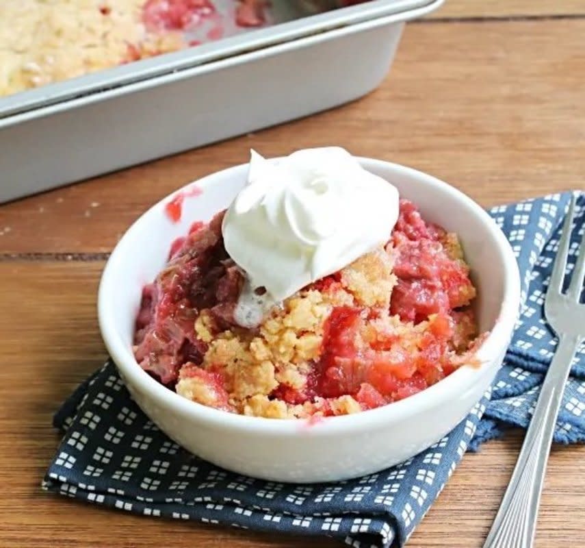 <p>Table For Seven</p><p>This easy cake starts with a cake mix and is filled with rhubarb and strawberry flavors.</p><p><strong>Get the recipe:<a href="https://ourtableforseven.com/2015/07/rhubarb-dump-cake.html" rel="nofollow noopener" target="_blank" data-ylk="slk:Rhubarb Strawberry Dump Cake;elm:context_link;itc:0;sec:content-canvas" class="link rapid-noclick-resp"> Rhubarb Strawberry Dump Cake</a></strong></p>