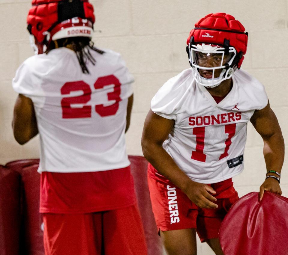 Linebacker Kobie McKinzie (11) takes part in team drills during the University of Oklahoma's first Spring football practice at the Everest Training Center in Norman, Okla. on Tuesday, March 22, 2022. 