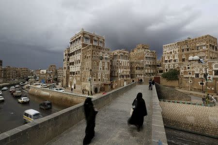 Women walk on a bridge in the old quarter of Yemen's capital Sanaa April 9, 2016. REUTERS/Khaled AbdullahREUTERS/Khaled Abdullah