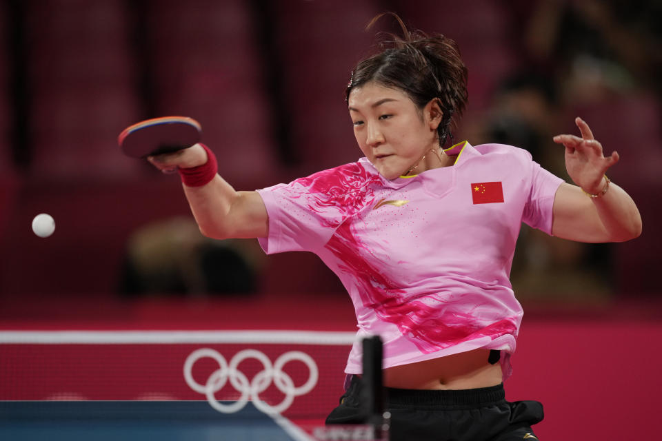 China's Chen Meng competes against countrywoman Sun Yingsha during the gold medal match of the table tennis women's singles at the 2020 Summer Olympics, Thursday, July 29, 2021, in Tokyo. (AP Photo/Kin Cheung)