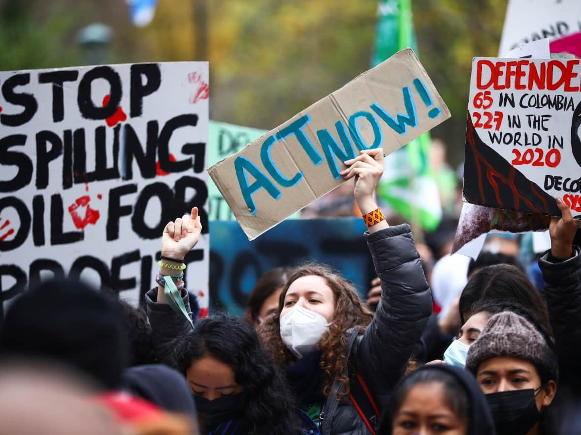 Hundreds marched during the UN Climate Change Conference (COP26), in Glasgow last year, but advocates say it's unlikely COP27 in Egypt will see the same level of mobilization, given the government's hostility toward public protests. (Hannah McKay/Reuters - image credit)