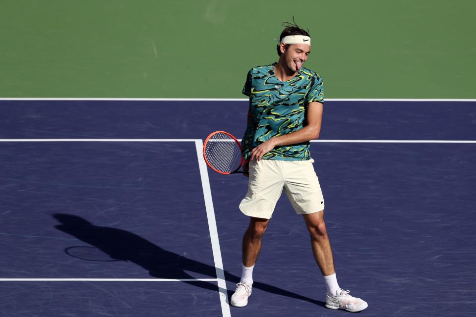 Taylor Fritz reacts during his win against Sebastian Baez during the BNP Paribas Open in Indian Wells, Calif., on Monday, March 13, 2023.