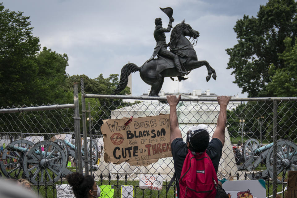 Protesters pull down a fence surrounding the statue of Andrew Jackson in an attempt to pull the statue down in Lafayette Square near the White House on June 22, 2020 in Washington, DC. (Drew Angerer/Getty Images)