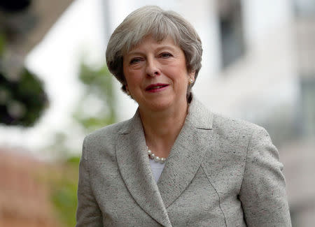 Theresa May arrives back at the Midland Hotel on the opening day of the Conservative Party Conference, in Manchester, Britain October 1, 2017. REUTERS/Hannah McKay