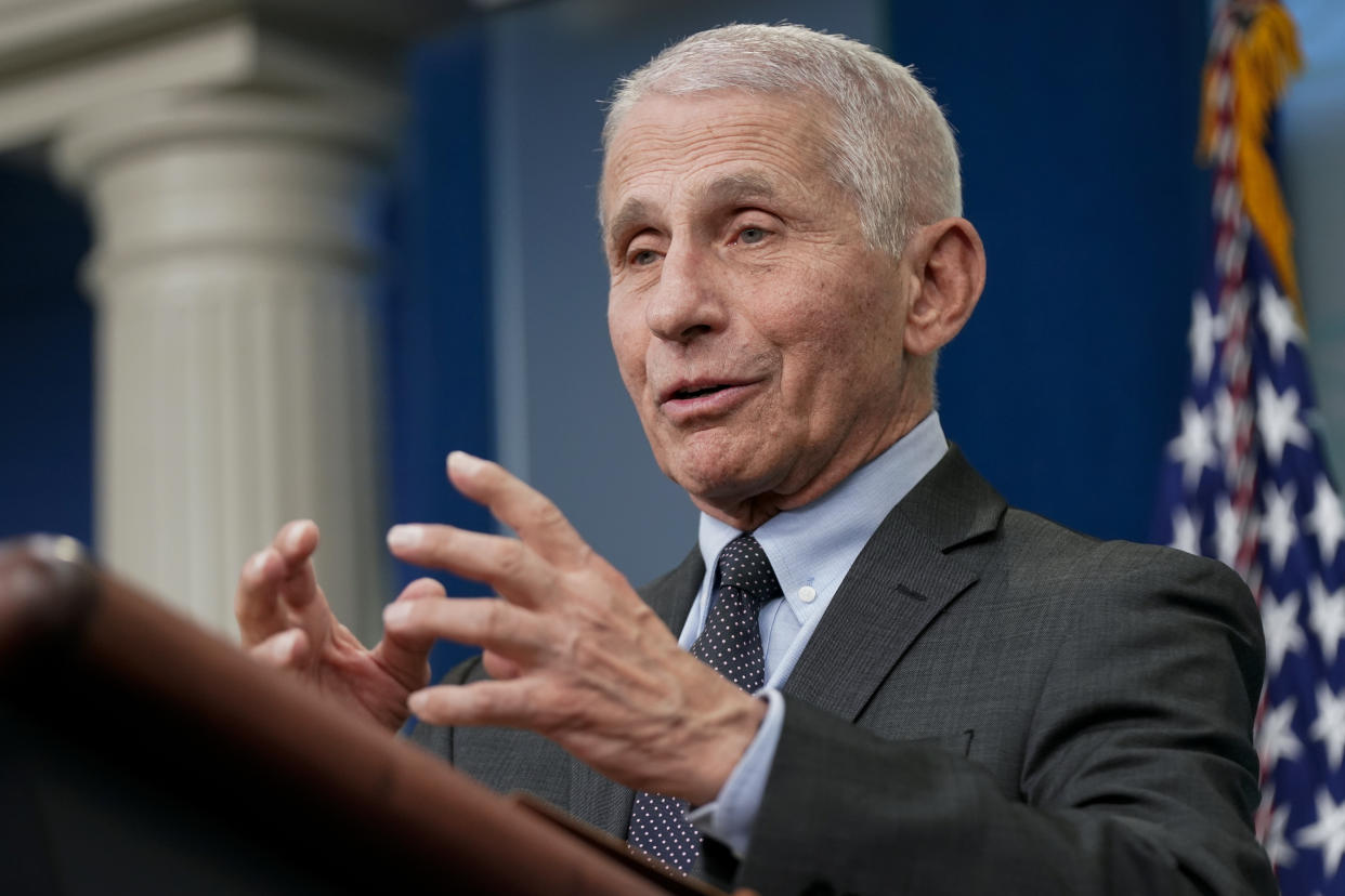Dr. Anthony Fauci at the microphone.