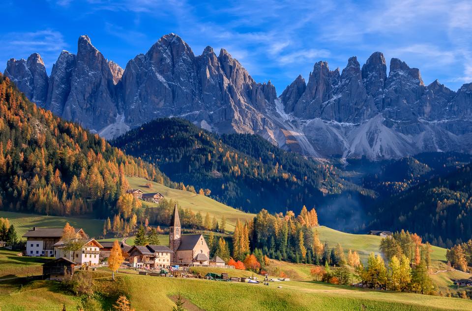 Golden autumn in Val di Funes valley and chapel Santa Maddalena. Odle mountain group. Dolomite's mountains, italy