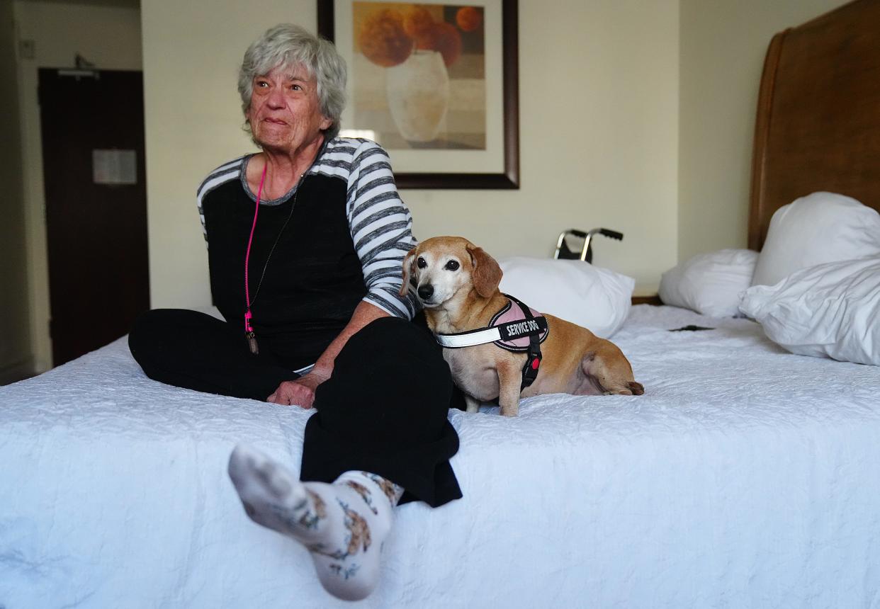 Kasey Dungan, on Jan. 20, 2022, in Phoenix, Ariz., talks about how she and her dog Sandy ended up homeless on the street for the first time in their lives.