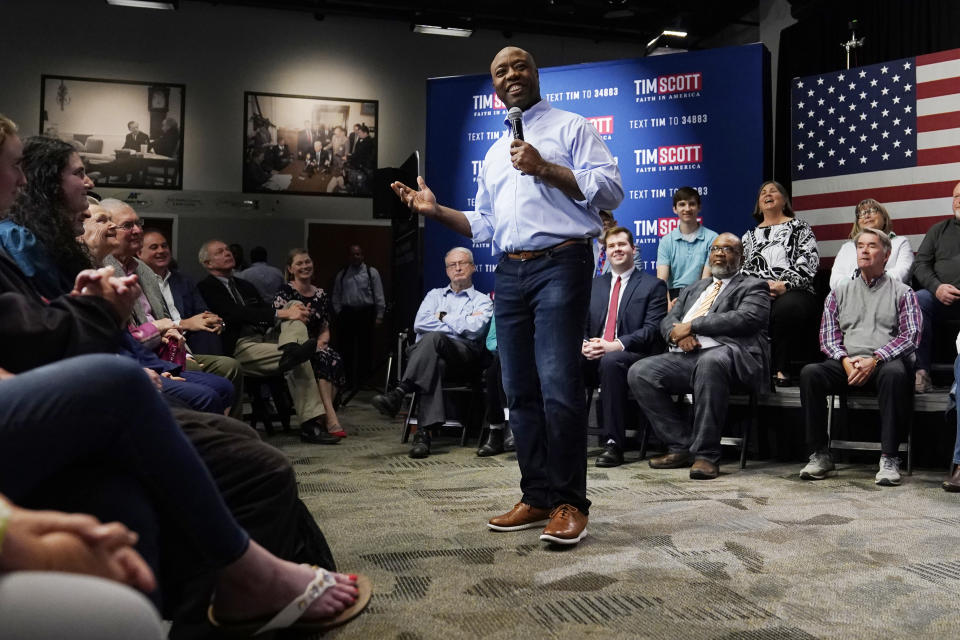 FILE - Sen. Tim Scott, R-S.C., speaks during a town hall, Monday, May 8, 2023, in Manchester, N.H. Scott has filed paperwork to enter the 2024 Republican presidential race. He'll be testing whether a more optimistic vision of America’s future can resonate with GOP voters who have elevated partisan brawlers in recent years. (AP Photo/Charles Krupa, File)