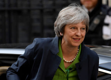 FILE PHOTO: Britain's Prime Minister Theresa May returns to Downing Street from the Houses of Parliament in London, Britain, June 12, 2018. REUTERS/Toby Melville/File Photo