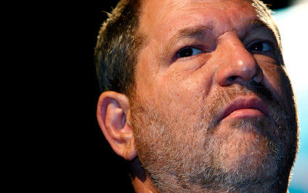 FILE PHOTO: Harvey Weinstein, co-chairman of the Weinstein Company, kicks off the Film Finance Circle conference with an informal discussion at the inaugural Middle East International Film Festival in Abu Dhabi, October 15, 2007. REUTERS/Steve Crisp/File Photo