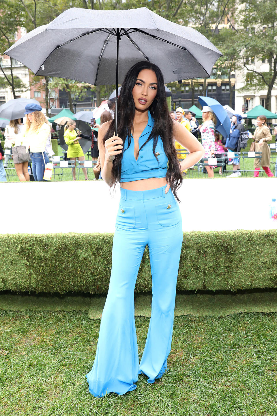 <p>Megan Fox arrives in a baby blue ensemble for the Moschino Spring/Summer 2022 fashion show on Sept. 9 in N.Y.C. </p>