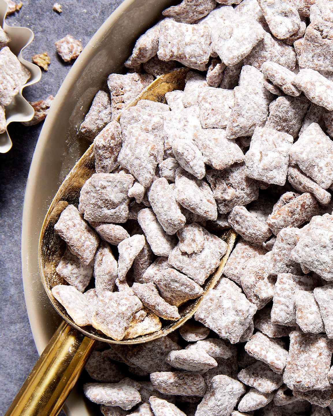 chex mix tossed in peanut butter and powdered sugar