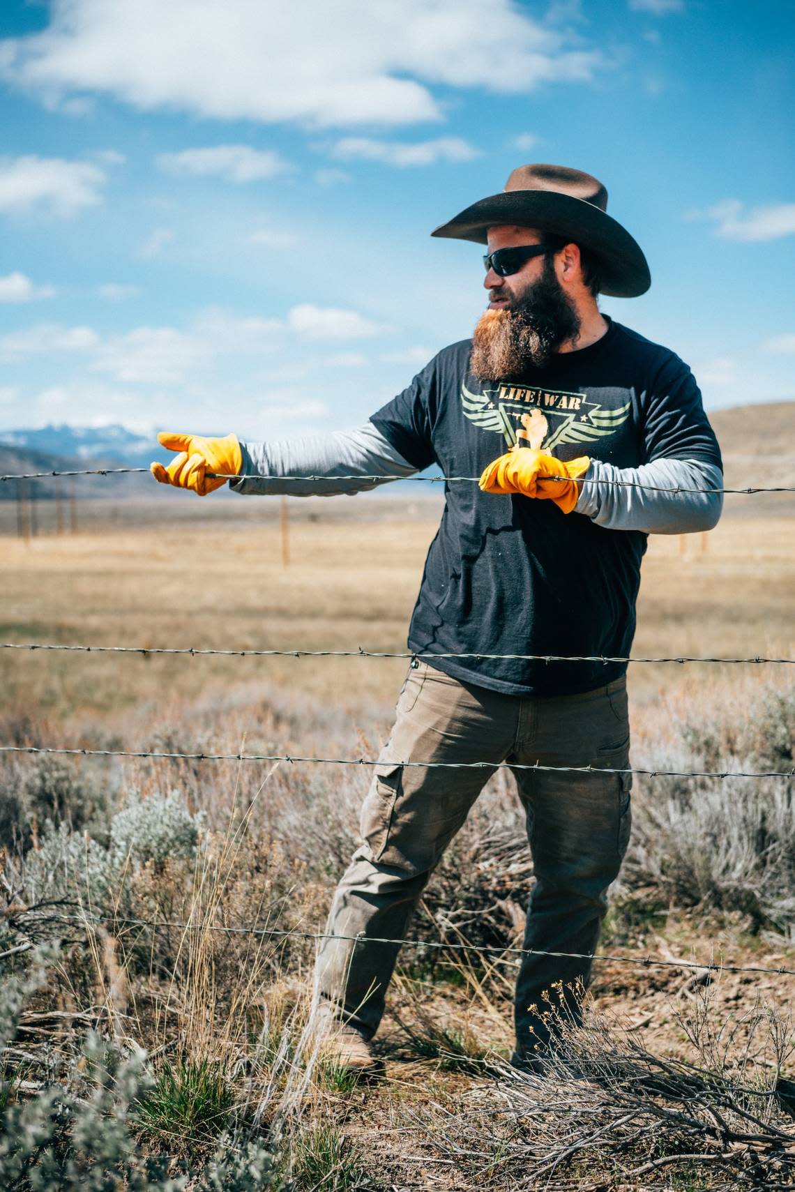 Mike Bushfield, of Kuna, works on a fence in Montana on a recent trip with Wishes 4 Warriors, a vetern-run outdoor adventure nonprofit organization that Bushfield said changed his life.