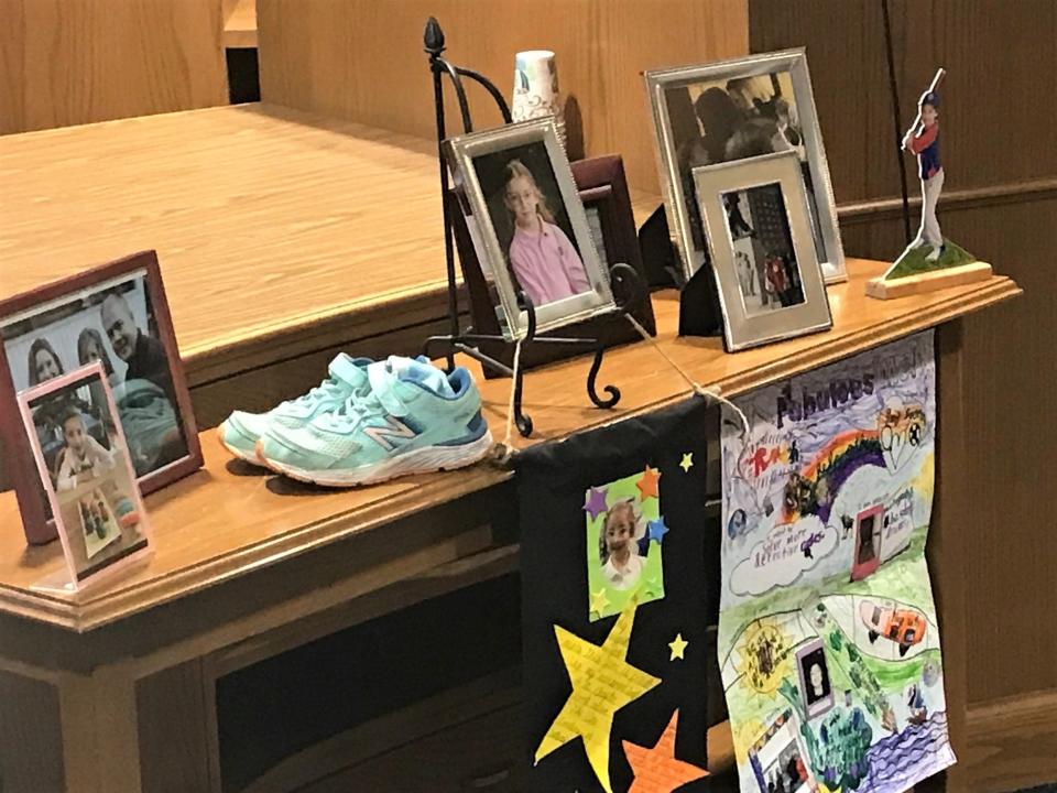 Photos and belongs of 9-year-old Ruth Jones were on display Thursday for Kim Horton's plea and sentencing hearing. The shoes in the photo are the ones she was wearing when she was killed on July 22 in Lithopolis.