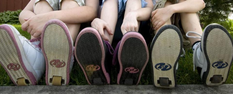 Kids wearing Heelys