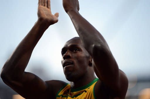 Jamaica's Usain Bolt reacts after competing in the men's 200m semi-finals at the athletics event of the London 2012 Olympic Games in London. Bolt stayed on track for an Olympic sprint double as he and Jamaican rival Yohan Blake cruised into Thursday's final of the 200m with commanding runs in their semi-finals on Wednesday