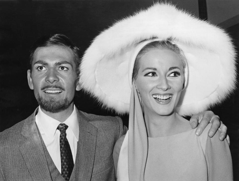 Actor Neil Connery, the brother of James Bond star Sean Connery, poses with actress Daniela Bianchi at a press conference for the upcoming Bond spoof 'Operation Kid Brother', aka 'OK Connery', Italy, 25th November 1966. (Photo by Keystone/Hulton Archive/Getty Images)