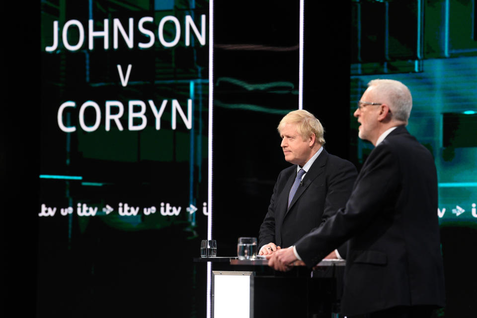 SALFORD, ENGLAND - NOVEMBER 19: (AVAILABLE FOR EDITORIAL USE UNTIL DECEMBER 19, 2019) In this handout image supplied by ITV, Prime Minister Boris Johnson and Leader of the Labour Party Jeremy Corbyn answer questions during the ITV Leaders Debate at Media Centre on November 19, 2019 in Salford, England. This evening ITV hosted the first televised head-to-head Leader’s debate of this election campaign. Leader of the Labour party, Jeremy Corbyn faced Conservative party leader, Boris Johnson after the SNP and Liberal Democrats lost a court battle to be included. (Photo by Jonathan Hordle//ITV via Getty Images)