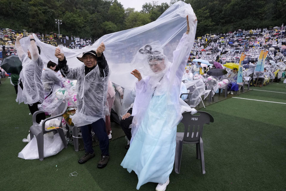 Buddhists wait for a lantern parade during the Lotus Lantern Festival, ahead of the birthday of Buddha at Dongguk University in Seoul, South Korea, Saturday, May 11, 2024. (AP Photo/Ahn Young-joon)