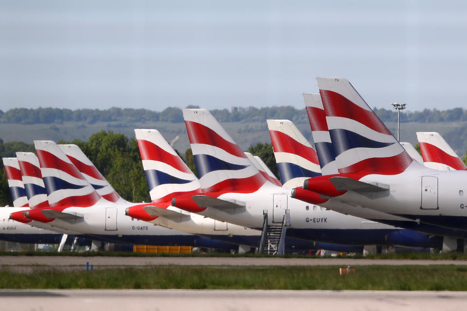 British Airways planes parked up in Gatwick after being grounded due to the coronavirus outbreak. Photo by Bryn Lennon/Getty Images