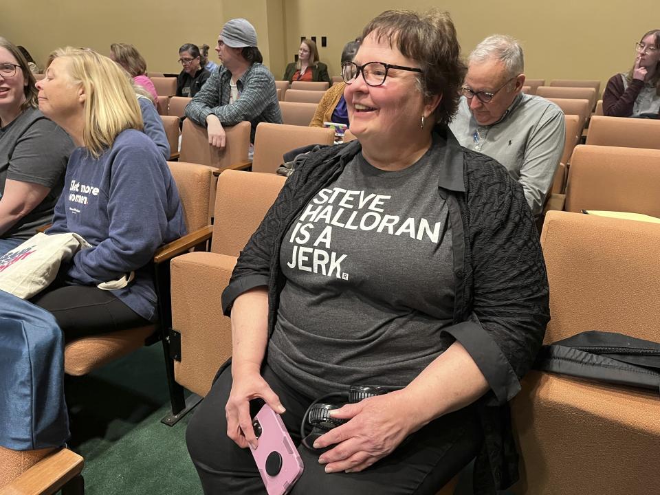 Thia Hartley, of Lincoln, Neb., shows her support for Nebraska state Sen. Machaela Cavanaugh at a hearing Thursday, March 18, 2024, before the Legislature's Executive Board.The hearing was held on a measure to censure Republican state Sen. Steve Halloran for remarks he made on the legislative floor March 18. (AP Photo/Margery Beck)