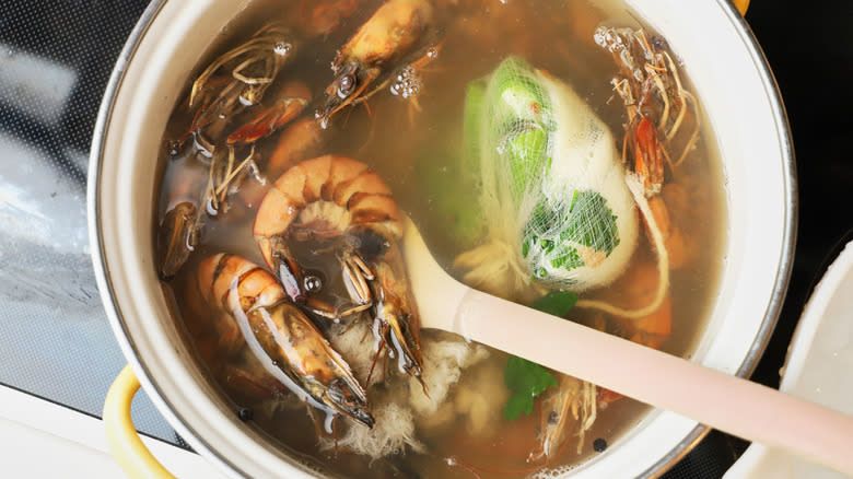 shrimp poaching in a pot