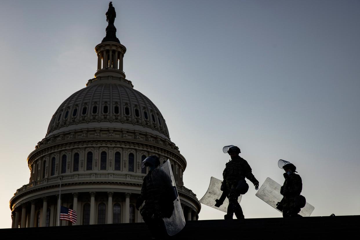 <p>Police patrol the US Capitol weeks after riot</p> (EPA)