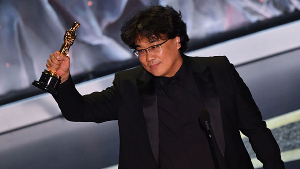 Director Bong Joon-ho accepts best Director before the whole film takes out the Best Film gong at the 2020 Oscars. Photo: Getty Images