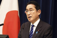 Japanese Prime Minister Fumio Kishida speaks before media members at his official residence in Tokyo, Saturday, Dec. 10, 2022, after an extraordinary Diet session. (Yoshikazu Tsuno/Pool Photo via AP)