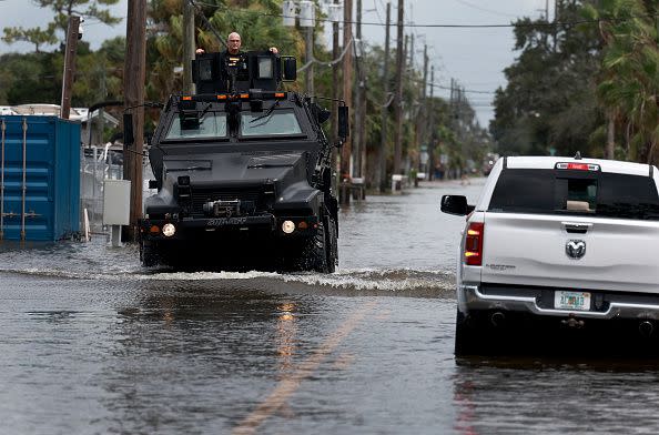 HUDSON, FLORIDA - AUGUST 30: A rescue vehicle drives through a flooded street after Hurricane Idalia passed offshore on August 30, 2023 in Hudson, Florida. Hurricane Idalia hit the Big Bend area on the Gulf Coast of Florida as a Category 3 storm. (Photo by Joe Raedle/Getty Images)