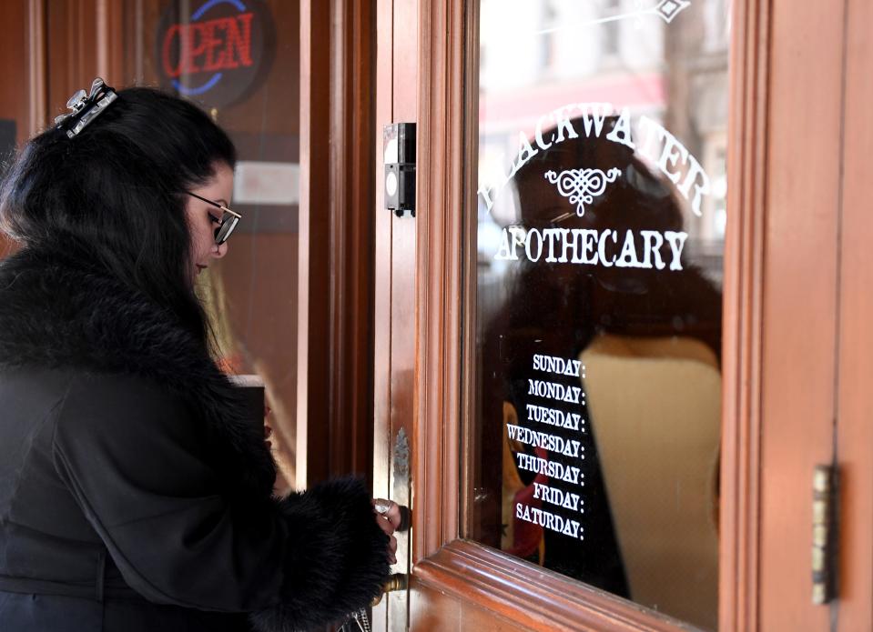 Nicole Blackwater, owner of Blackwater Apothecary, opens her store Wednesday, Feb. 21, 2024, at 107 W Main St in Salisbury, Maryland