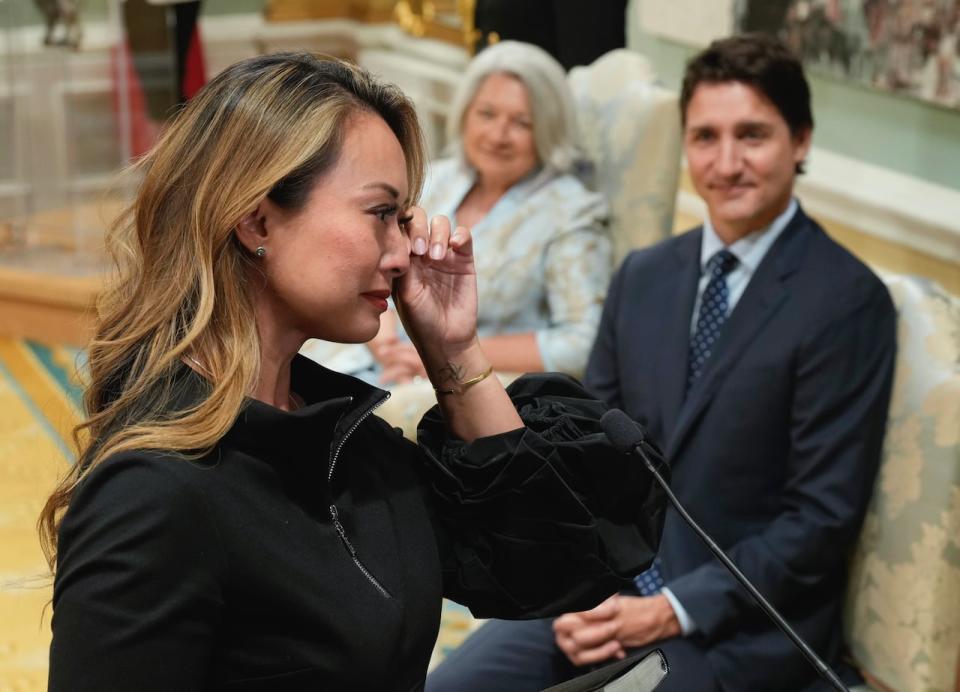 Prime Minister Justin Trudeau and Gov.-Gen. Mary Simon look on as an emotional Rechie Valdez is sworn in as small business minister during a cabinet shuffle on July 26, 2023 in Ottawa. (Adrian Wyld/The Canadian Press - image credit)