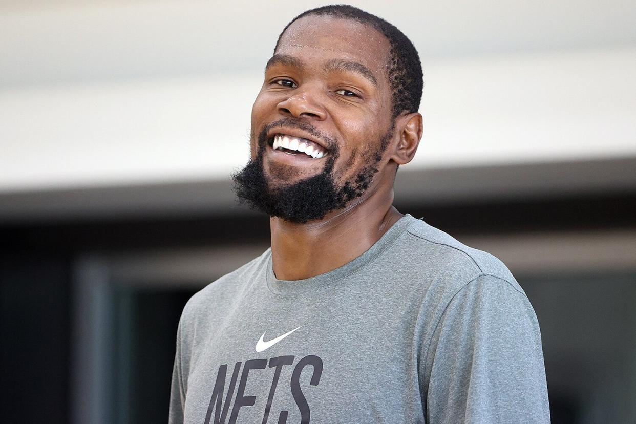 Kevin Durant #7 of the Brooklyn Nets smiles during an open practice on October 8, 2022 at HSS Training Center in Brooklyn, New York.