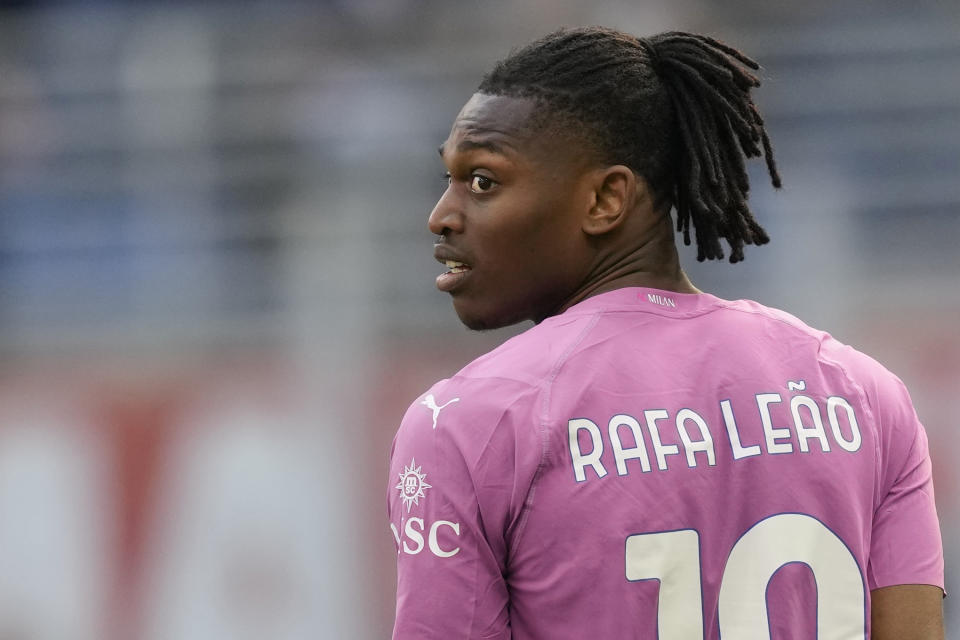 AC Milan's Rafael Leao reacts after scoring his side's third goal during the Serie A soccer match between AC Milan and Lecce at the San Siro stadium, in Milan, Italy, Saturday, April 6, 2024. (AP Photo/Antonio Calanni)