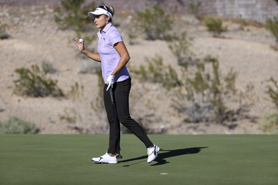 Lexi Thompson waves after making a putt on the sixth hole during the first day of the Shriners Children's Open golf tournament, Thursday, Oct. 12, 2023, in Las Vegas. (AP Photo/Ian Maule)