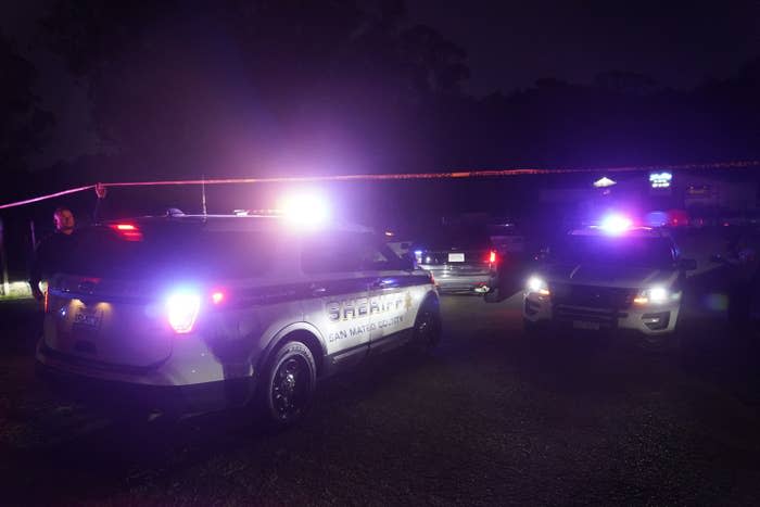 Law enforcement personnel control the scene of a shooting on Jan. 23, in Half Moon Bay, California.