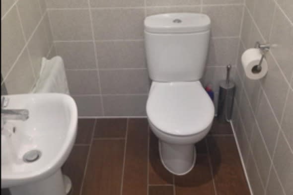 Off centre toilet