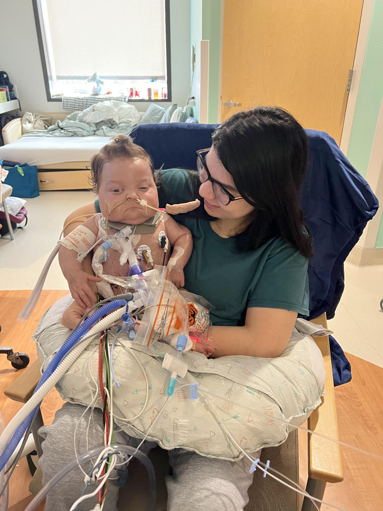 Savannah Bryer-Campbell holds her baby, Hunter, in his hospital room. (Photo/Courtesy)