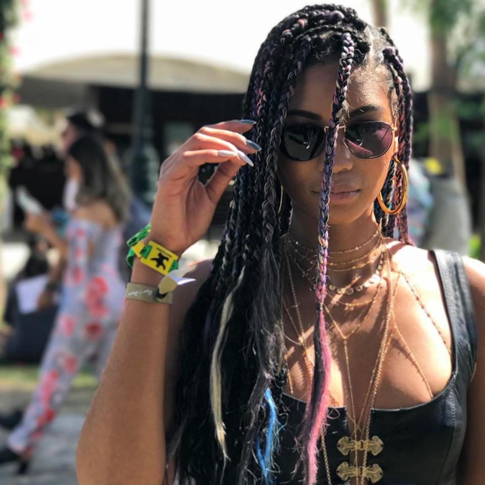 Take cues from Chanel Iman, who added pink, blue, and yellow hues to her box braids, giving them that summer festival-ready look we love. And the best part? There's no bleaching or coloring required.