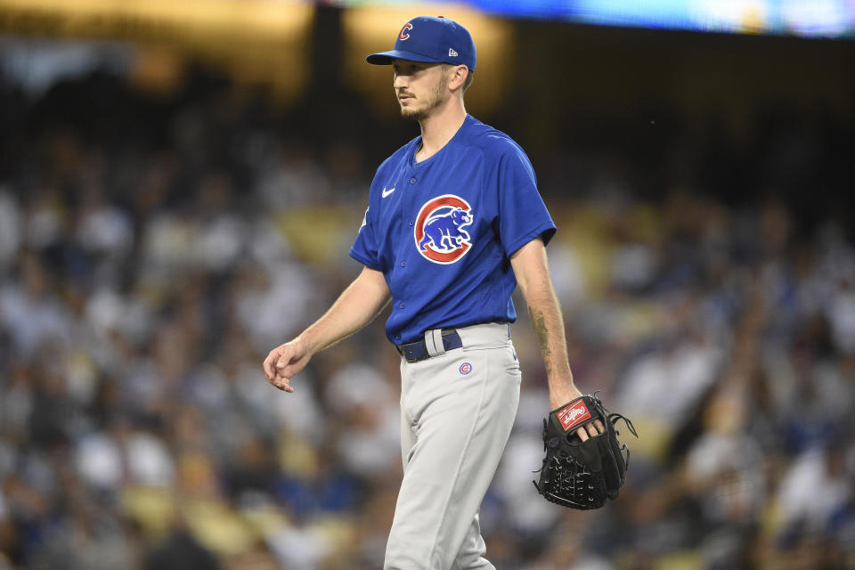 Chicago Cubs starting pitcher Zach Davies walks off the field during the third inning of a baseball game against the Los Angeles Dodgers in Los Angeles, Thursday, June 24, 2021. (AP Photo/Kelvin Kuo)