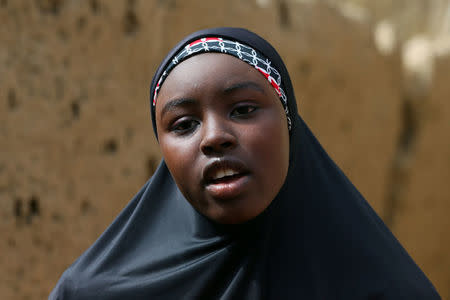 Amina Usman, a 15-year-old student, who was among the pupils who escaped the attack on the school, speaks in Dapchi in the northeastern state of Yobe, Nigeria February 23, 2018. REUTERS/Afolabi Sotunde