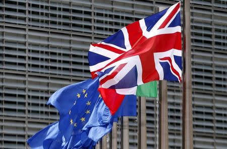 British flag and European Union flags flutter outside the EU Commission headquarters in Brussels, Belgium, June 28, 2016. REUTERS/ Francois Lenoir