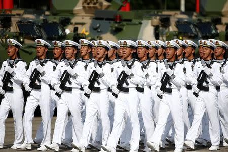 Troops shout as they prepare for the arrival of Chinese President Xi Jinping (unseen) at the People's Liberation Army (PLA) Hong Kong Garrison as part of events marking the 20th anniversary of the city's handover from British to Chinese rule, in Hong Kong, China June 30, 2017. REUTERS/Damir Sagolj