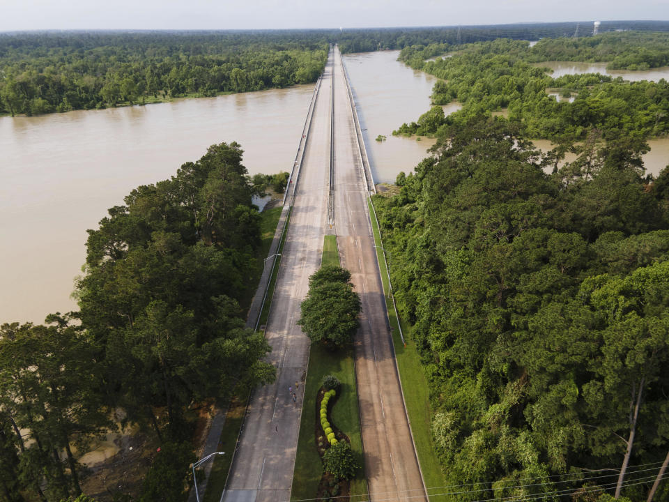 The bridge over Lake Houston along West Lake Houston Parkway from Kingwood to Atascocita is seen after it was closed due to high water on either side of the thoroughfare, Saturday, May 4, 2024, in Kingwood, Texas. (Jason Fochtman/Houston Chronicle via AP)