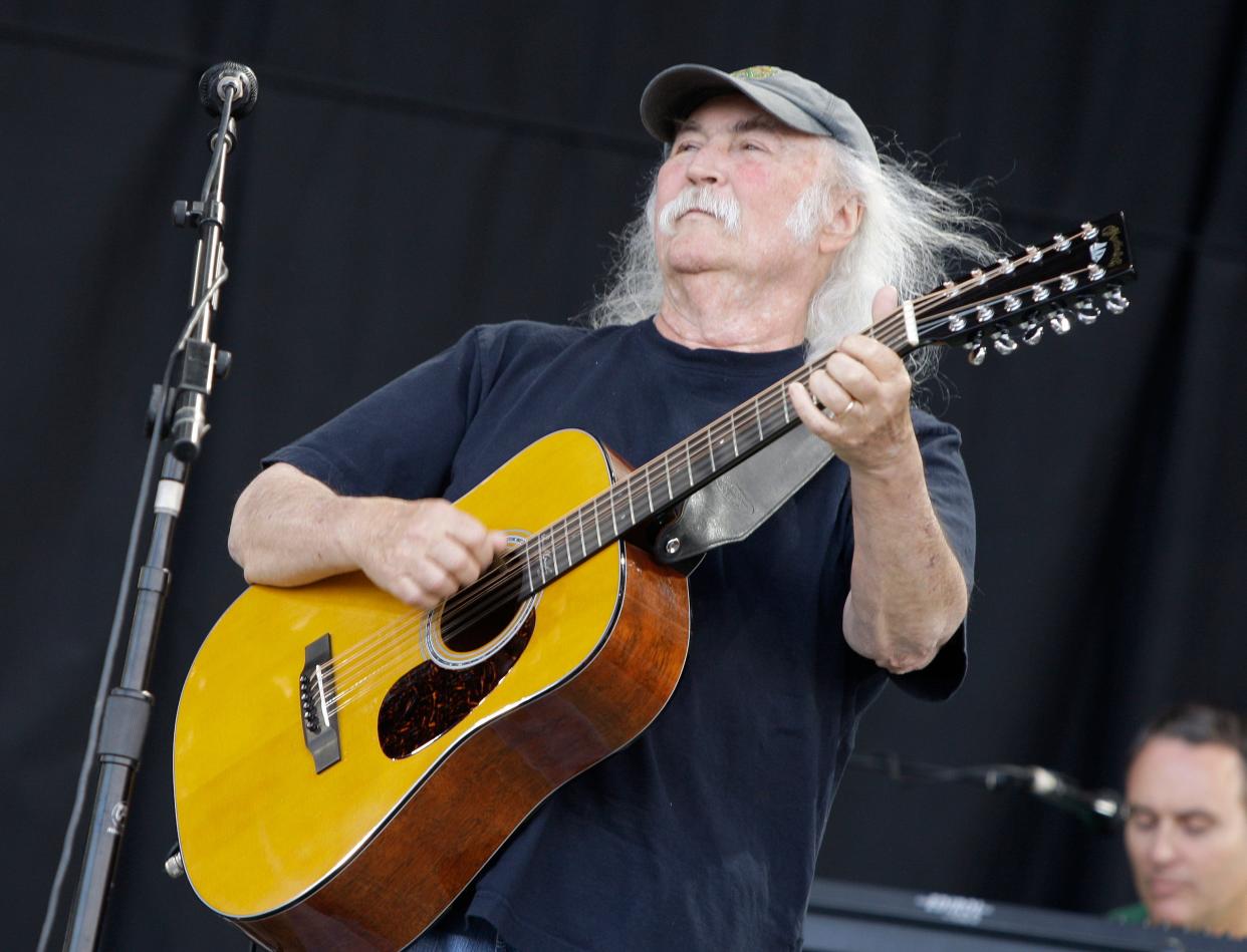David Crosby of the band Crosby, Stills and Nash, performs at Glastonbury Festival in England, on June 27, 2009. Crosby, the brash rock musician who evolved from a baby-faced harmony singer with the Byrds to a mustachioed hippie superstar and an ongoing troubadour in Crosby, Stills, Nash & (sometimes) Young, has died at age 81. His death was reported Thursday, Jan. 19, 2023, by multiple outlets.
