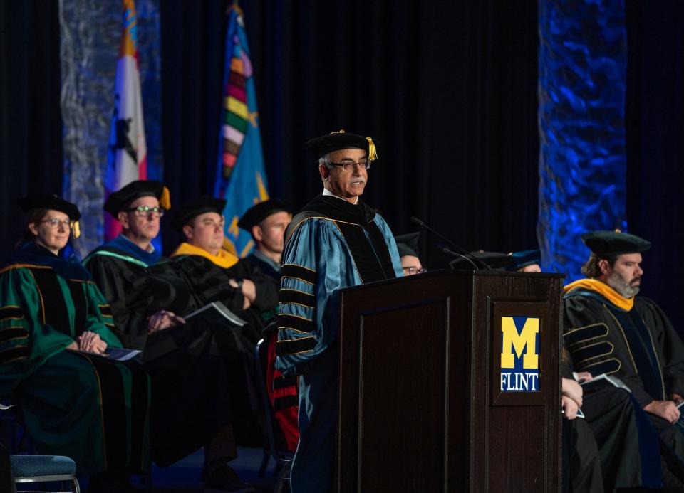 U-M Flint chancellor Debasish Dutta speaks to students during a graduation for the U-M Flint College of Arts and Sciences on Sunday, December 18, 2022, at the Riverfront Conference Center in downtown Flint.