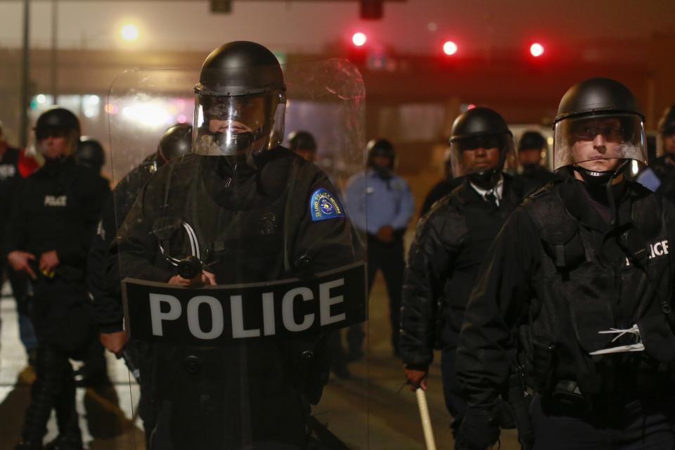 St. Louis Police department officers block the Grand bridge in St. Louis, Missouri, early October 13, 2014. (REUTERS/Shannon Stapleton)